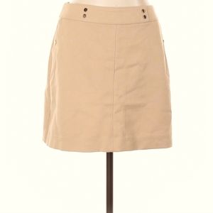 H&M tan skirt with gold accents